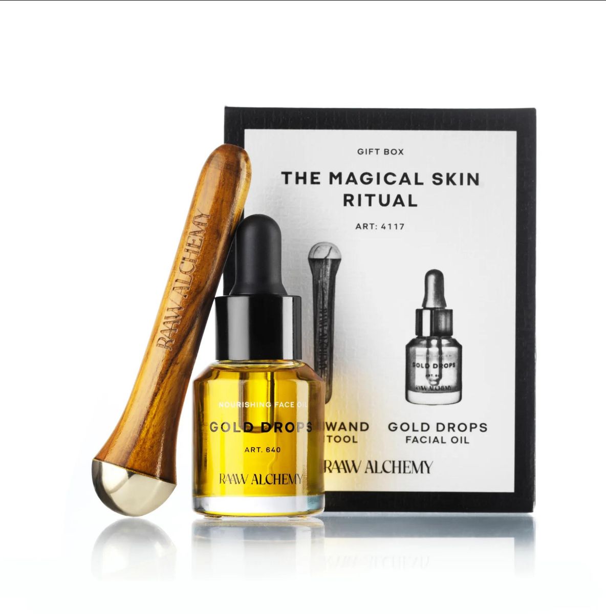 Geschenkbox 'The Magical Skin Ritual' mit Gesichtsöl 'Gold Drops' und Massagestab von Raw Alchemy.